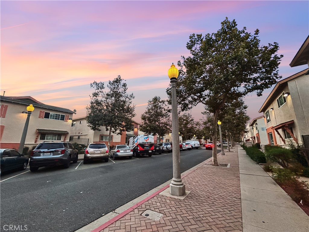 1109 South Minnie Street Santa Ana, CA 92701 - Photo 3 of 20 a view of street with parked cars