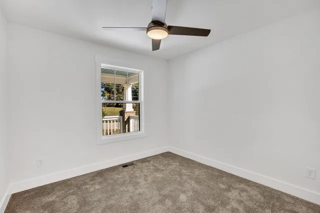 a bathroom with a bathtub and a toilet