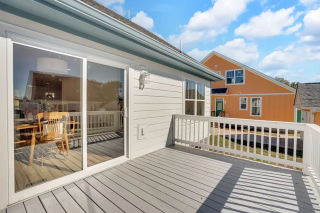 an aerial view of a residential houses with outdoor space