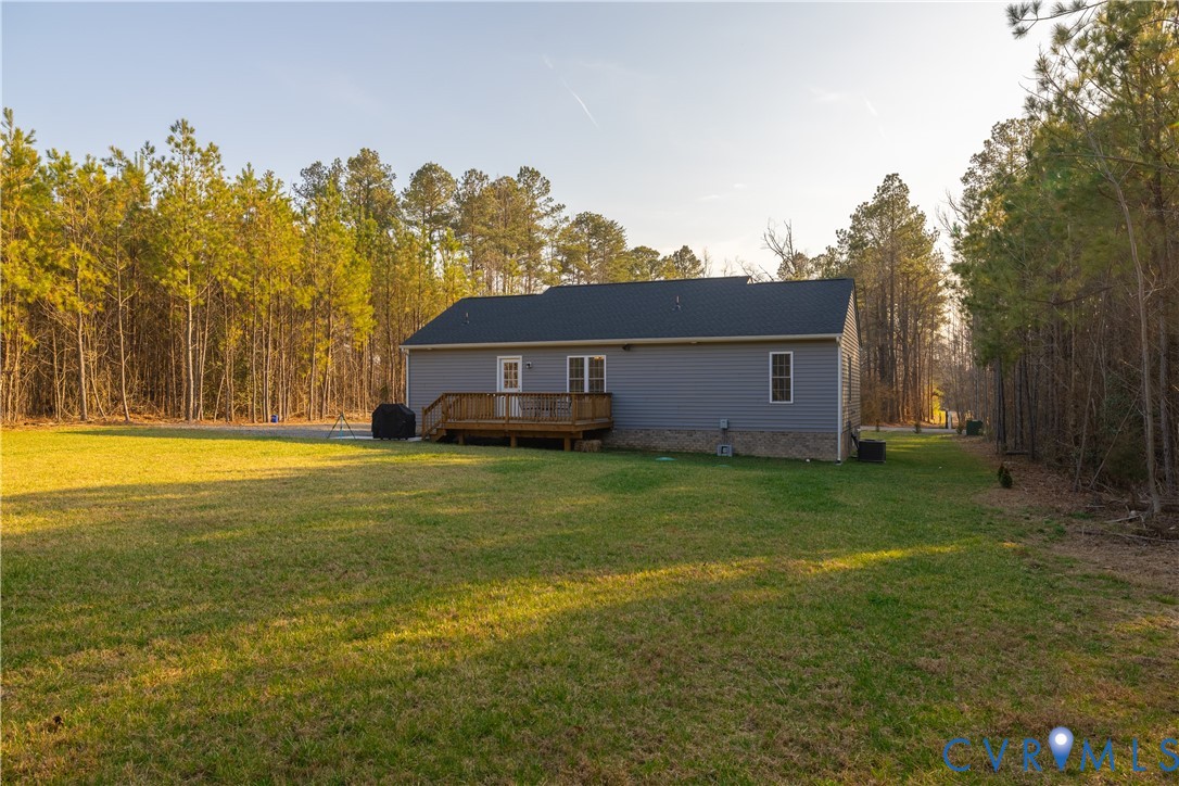 180 Barefords Mill Road Dunnsville, VA 22454 - Photo 26 of 27 a house view with a garden space