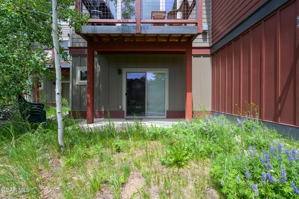 a view of a backyard of the house