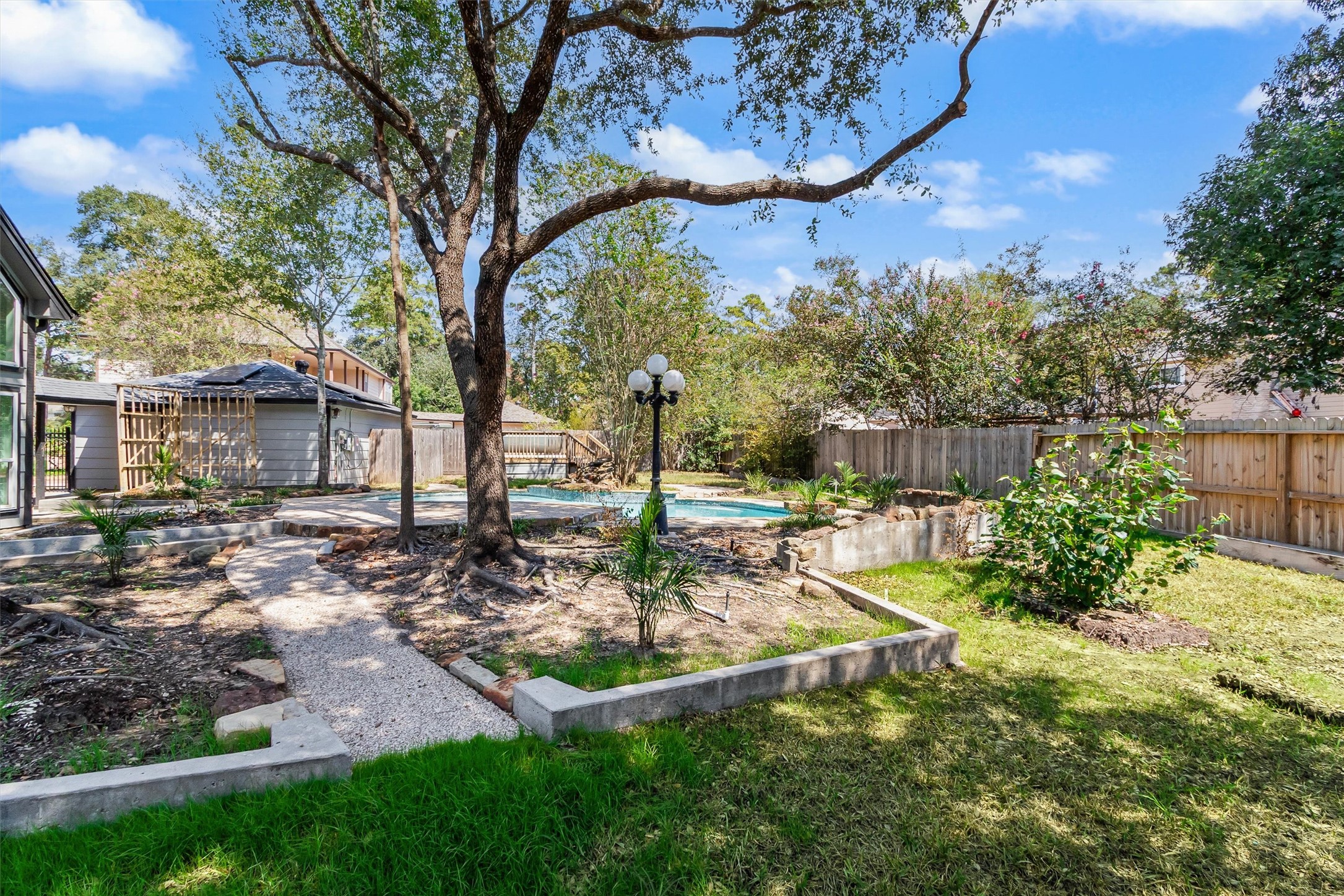 25010 Kingsdown Drive Spring, TX 77389 - Photo 28 of 33 Backyard is amazing for entertaining