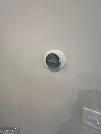 a bathroom with a shower and a sink