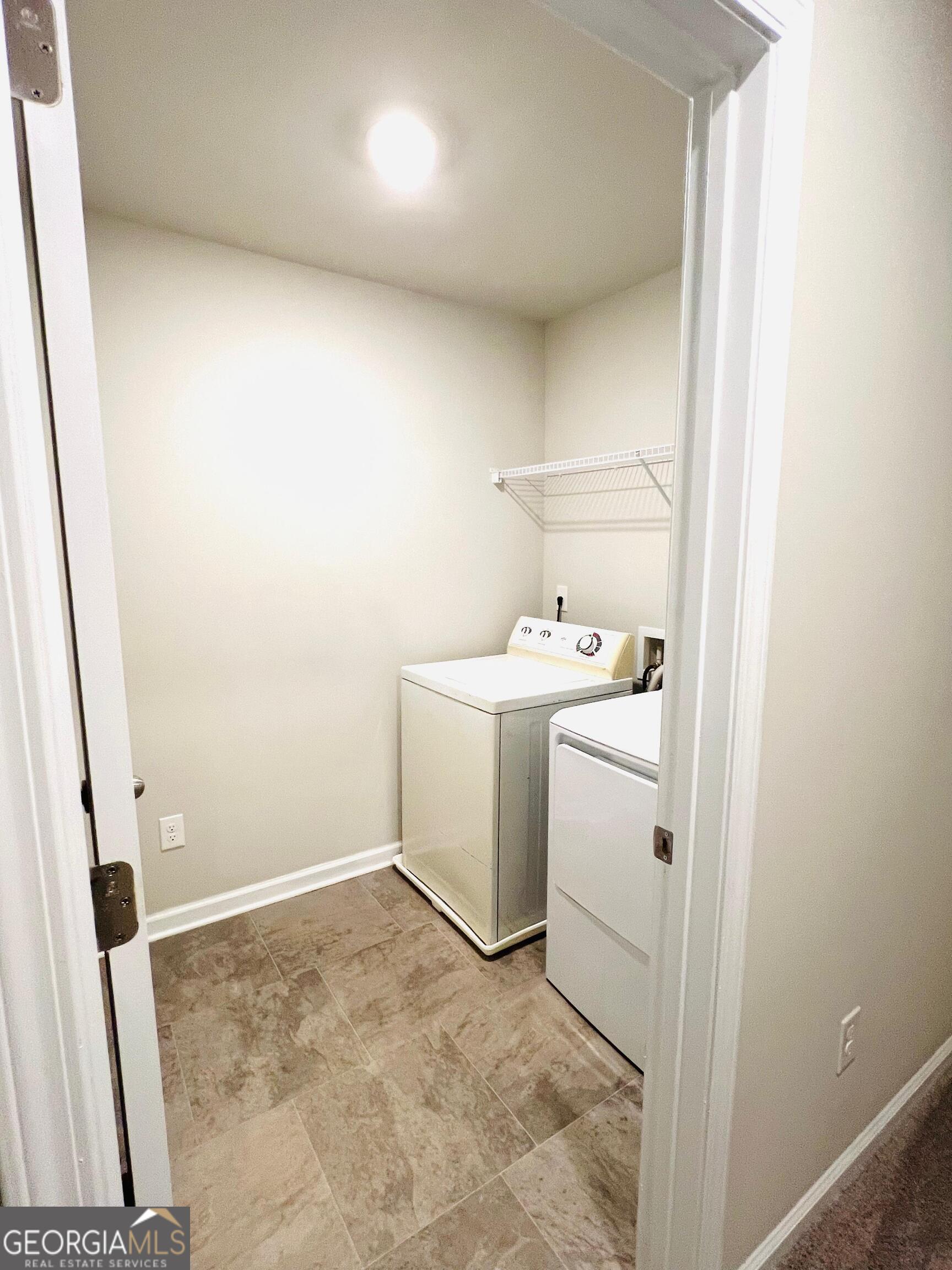 2206 Justify Lane Lithonia, GA 30058 - Photo 18 of 25 a utility room with dryer and washer