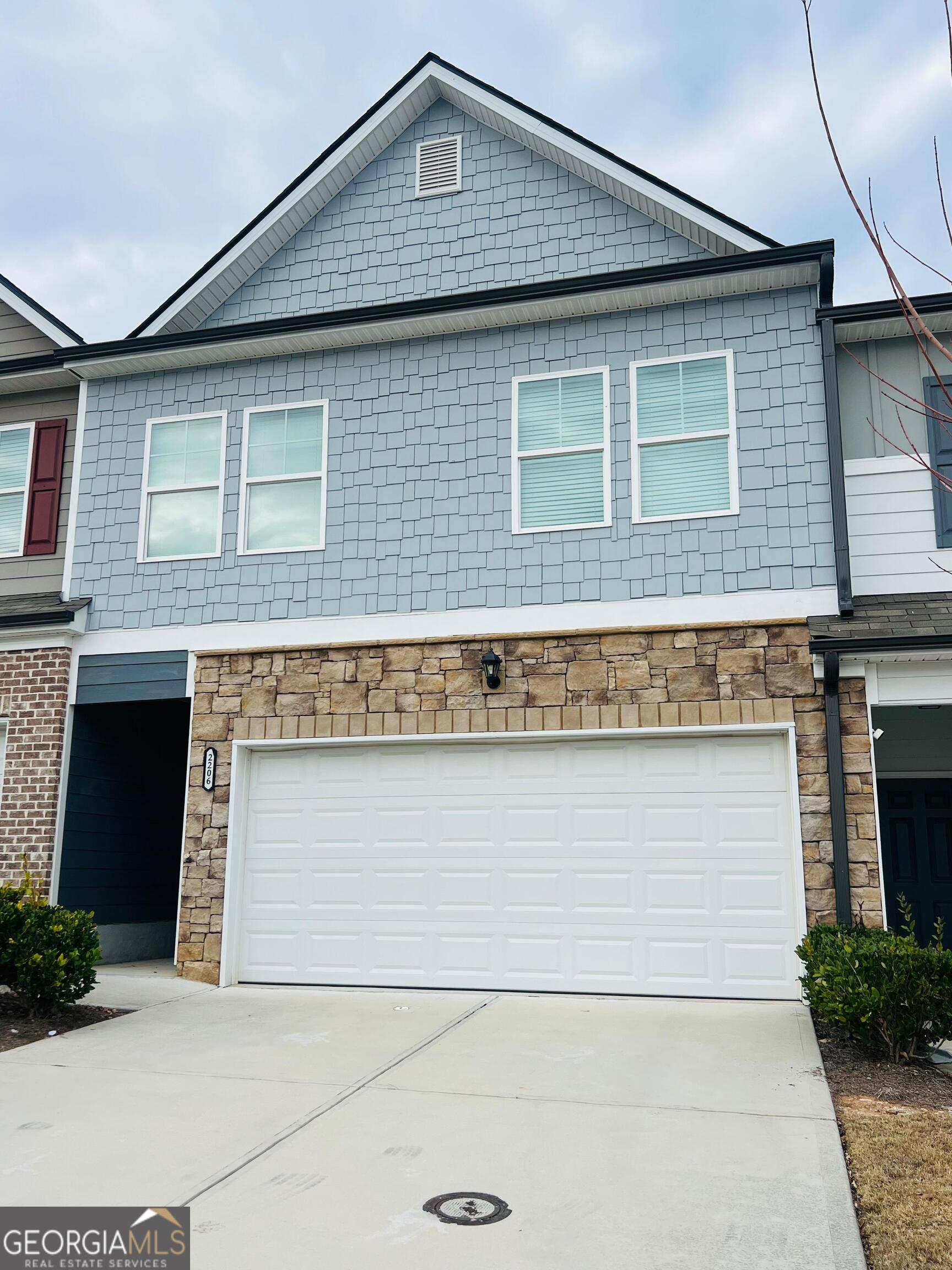 2206 Justify Lane Lithonia, GA 30058 - Photo 2 of 25 a front view of a house