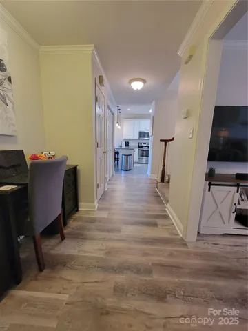 a living room with fireplace furniture and a flat screen tv