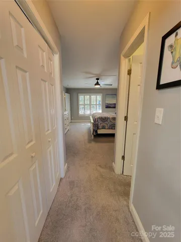 a spacious bathroom with a double vanity sink mirror and toilet