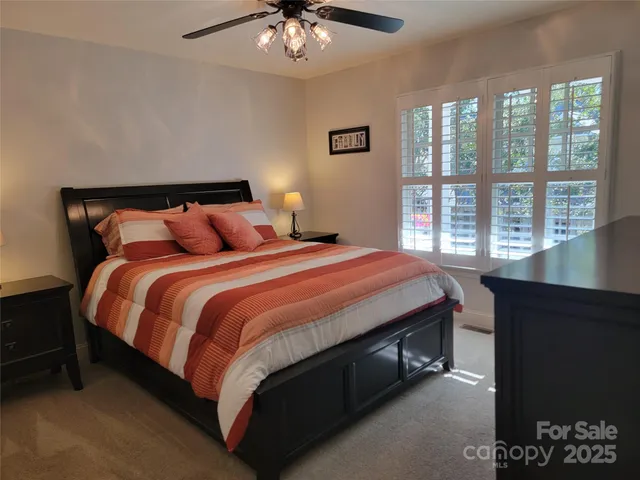 a view of a pathway with a balcony