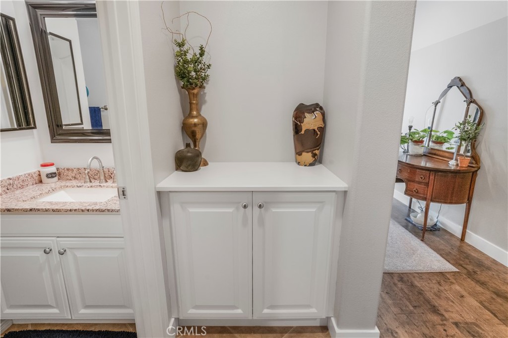 35814 Anderson Street Beaumont, CA 92223 - Photo 20 of 75 a bathroom with a sink a mirror and vanity