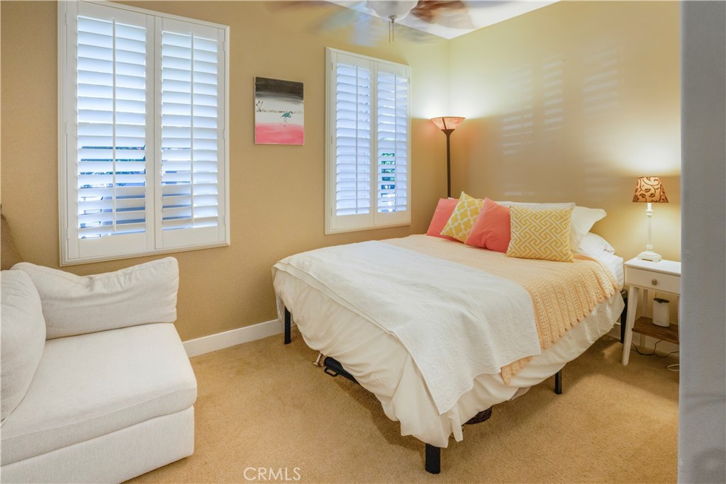 35814 Anderson Street Beaumont, CA 92223 - Photo 21 of 75 a bedroom with a bed and a couch