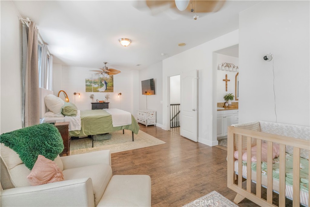 35814 Anderson Street Beaumont, CA 92223 - Photo 29 of 75 a living room with furniture and wooden floor