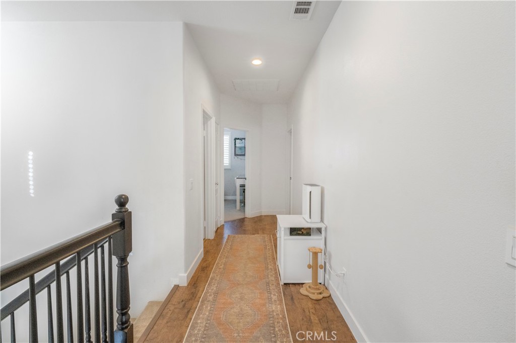 35814 Anderson Street Beaumont, CA 92223 - Photo 36 of 75 a view of hallway with wooden floor