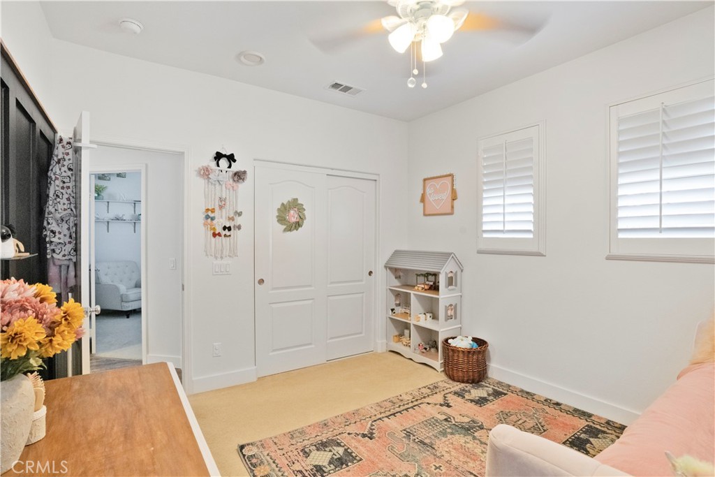 35814 Anderson Street Beaumont, CA 92223 - Photo 46 of 75 a bedroom with a bed and a dresser