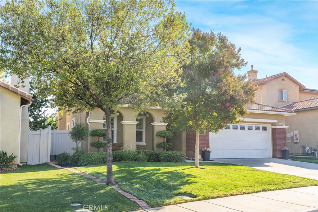 35814 Anderson Street Beaumont, CA 92223 - Photo 60 of 75 a view of a house with a yard and tree s