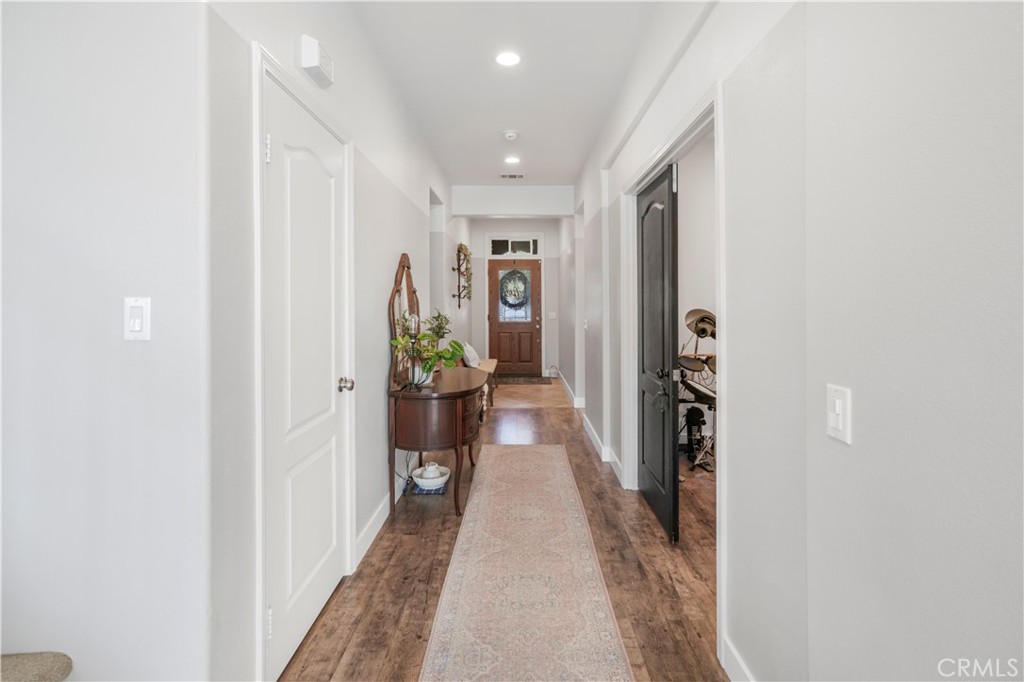 35814 Anderson Street Beaumont, CA 92223 - Photo 10 of 75 a view of a hallway with a potted plant