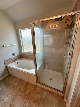 a bathroom with a bath tub