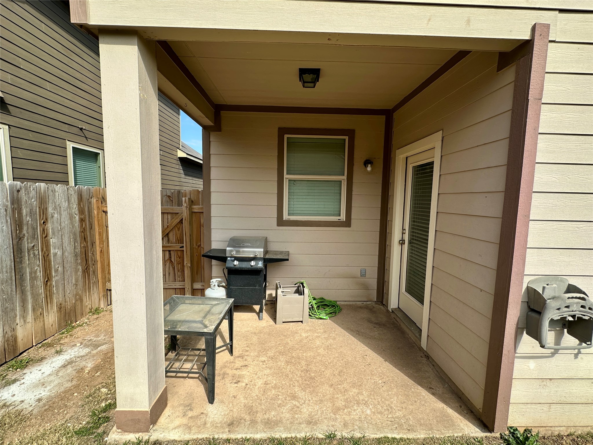 117 Chickadee Lane Leander, TX 78641 - Photo 21 of 24 a backyard of a house with outdoor seating
