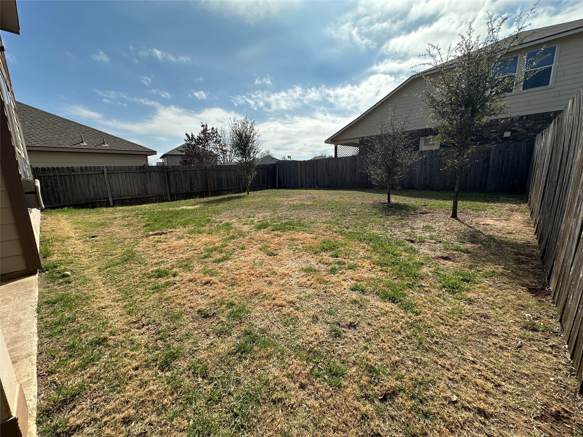 117 Chickadee Lane Leander, TX 78641 - Photo 22 of 24 a backyard of a house