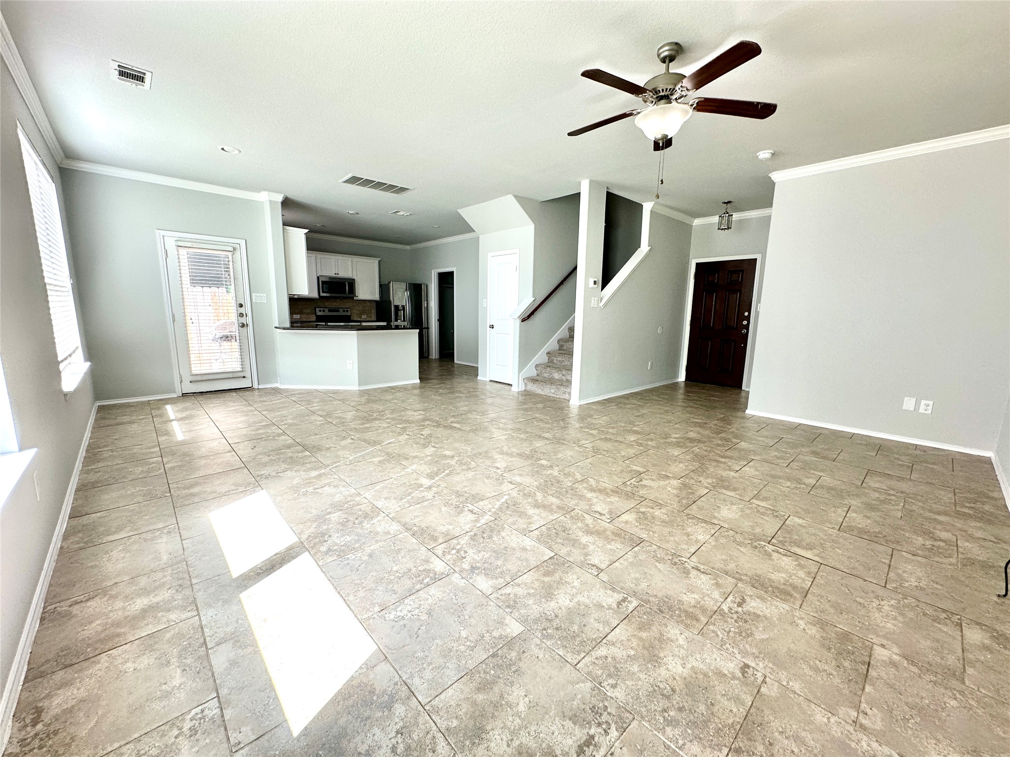 117 Chickadee Lane Leander, TX 78641 - Photo 8 of 24 a view of a kitchen with a sink and a window