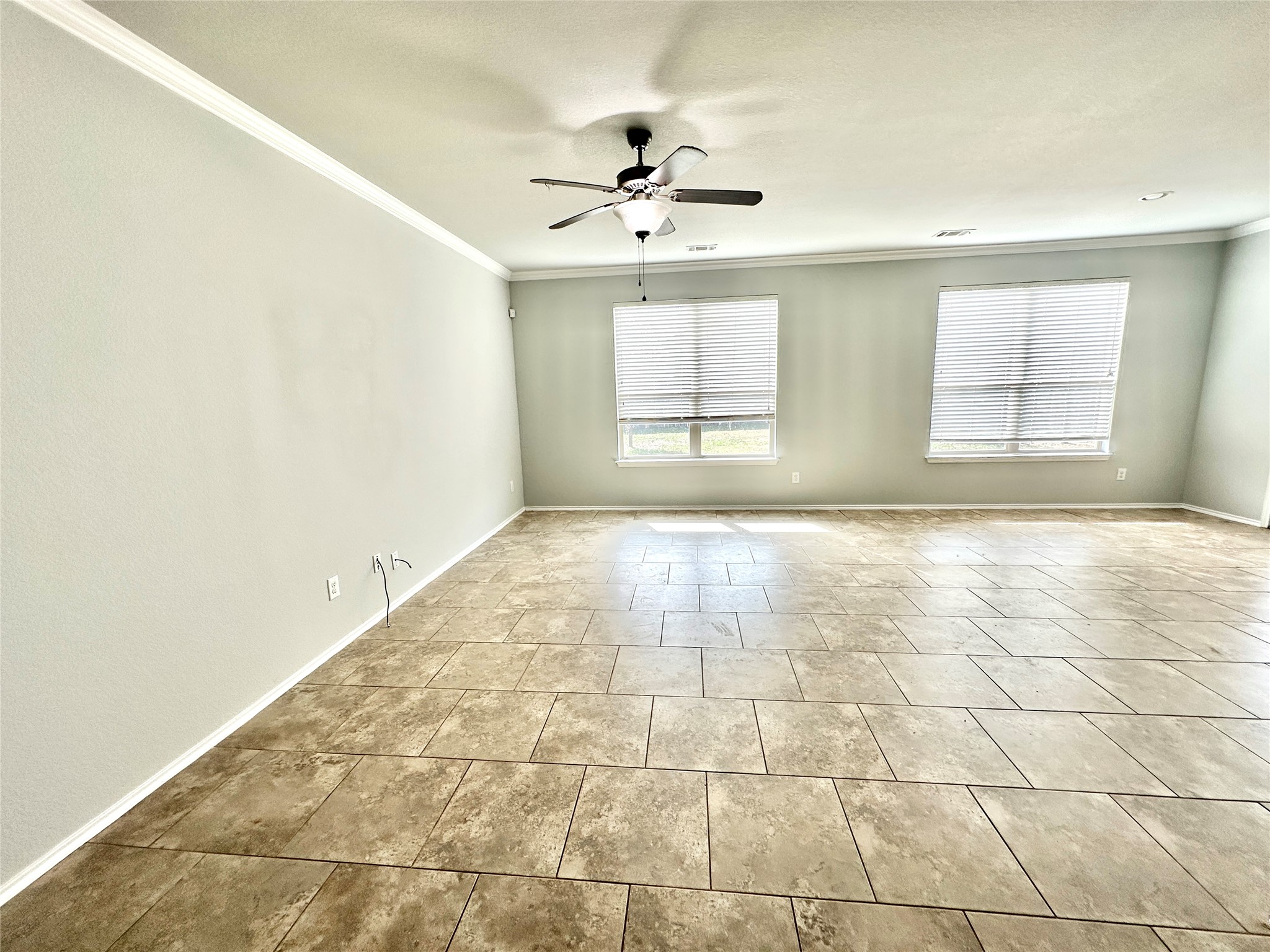 117 Chickadee Lane Leander, TX 78641 - Photo 9 of 24 a view of an empty room with a window