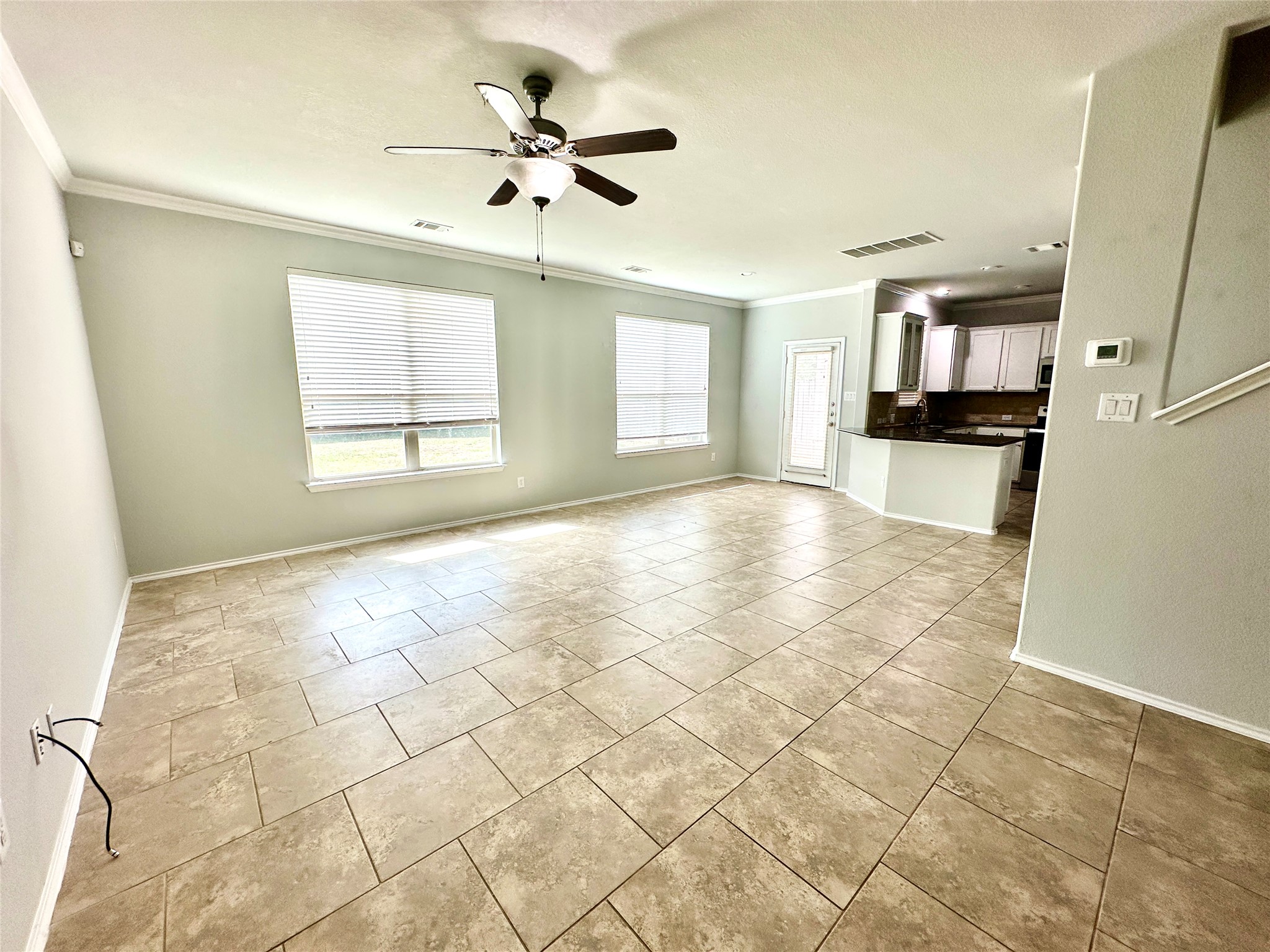 117 Chickadee Lane Leander, TX 78641 - Photo 10 of 24 a view of an empty room with a window