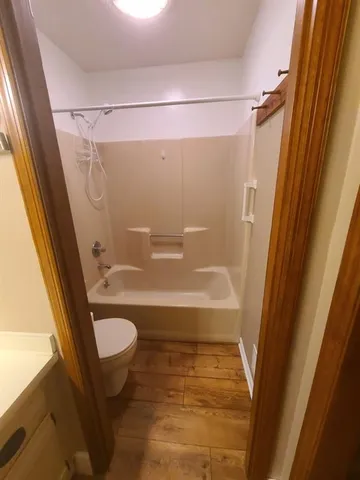 a bathroom with a sink and a shower