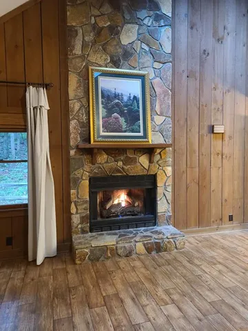 a living room with a fireplace
