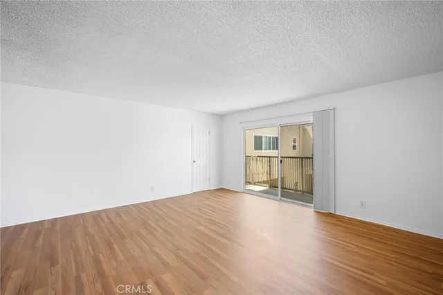 a view of a balcony with a potted plant