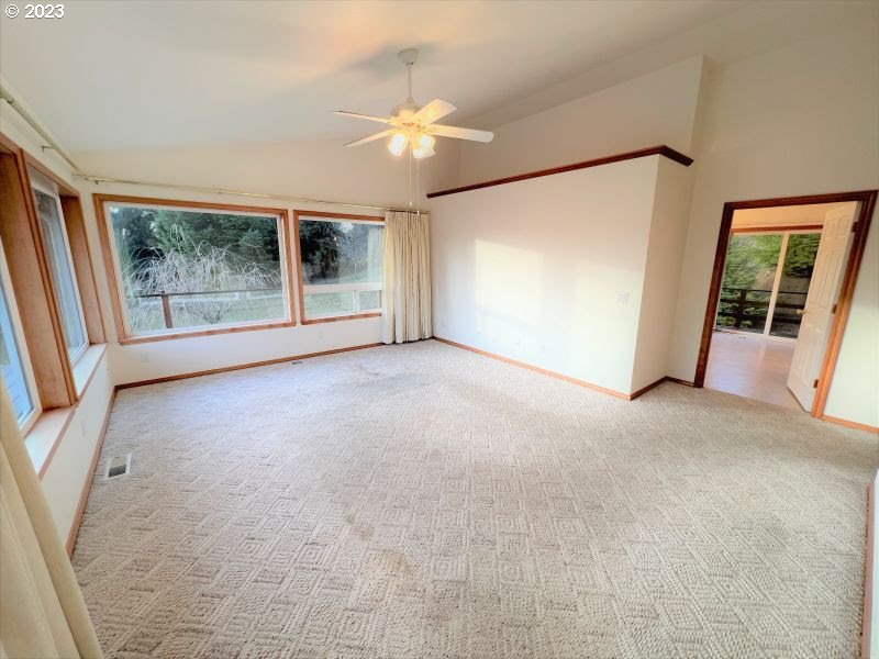 92831 Walluski Loop Astoria, OR 97103 - Photo 18 of 32 a view of a room with a large window