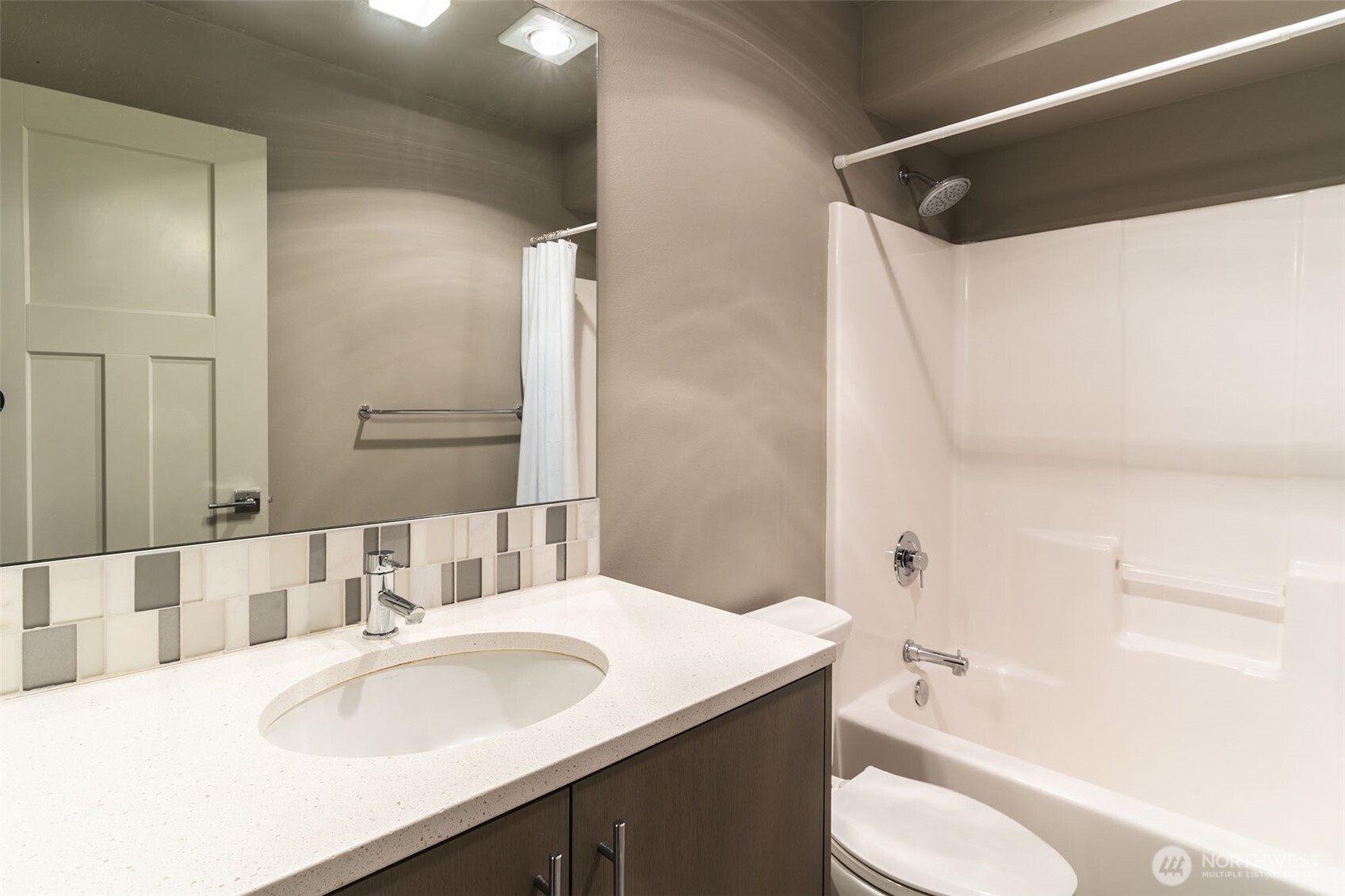 1626 East Yesler Way Seattle, WA 98122 - Photo 8 of 12 a bathroom with a sink and a mirror