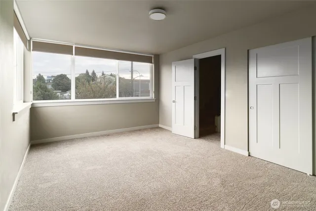 an empty room with windows