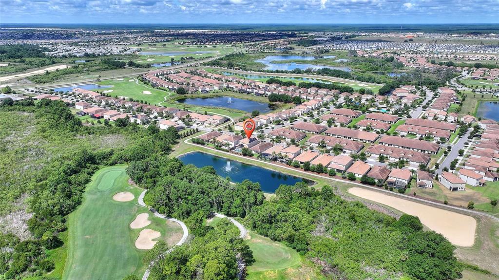 1089 Blackwolf Run Road Davenport, FL 33896 - Photo 57 of 82 a view of a lake with a city