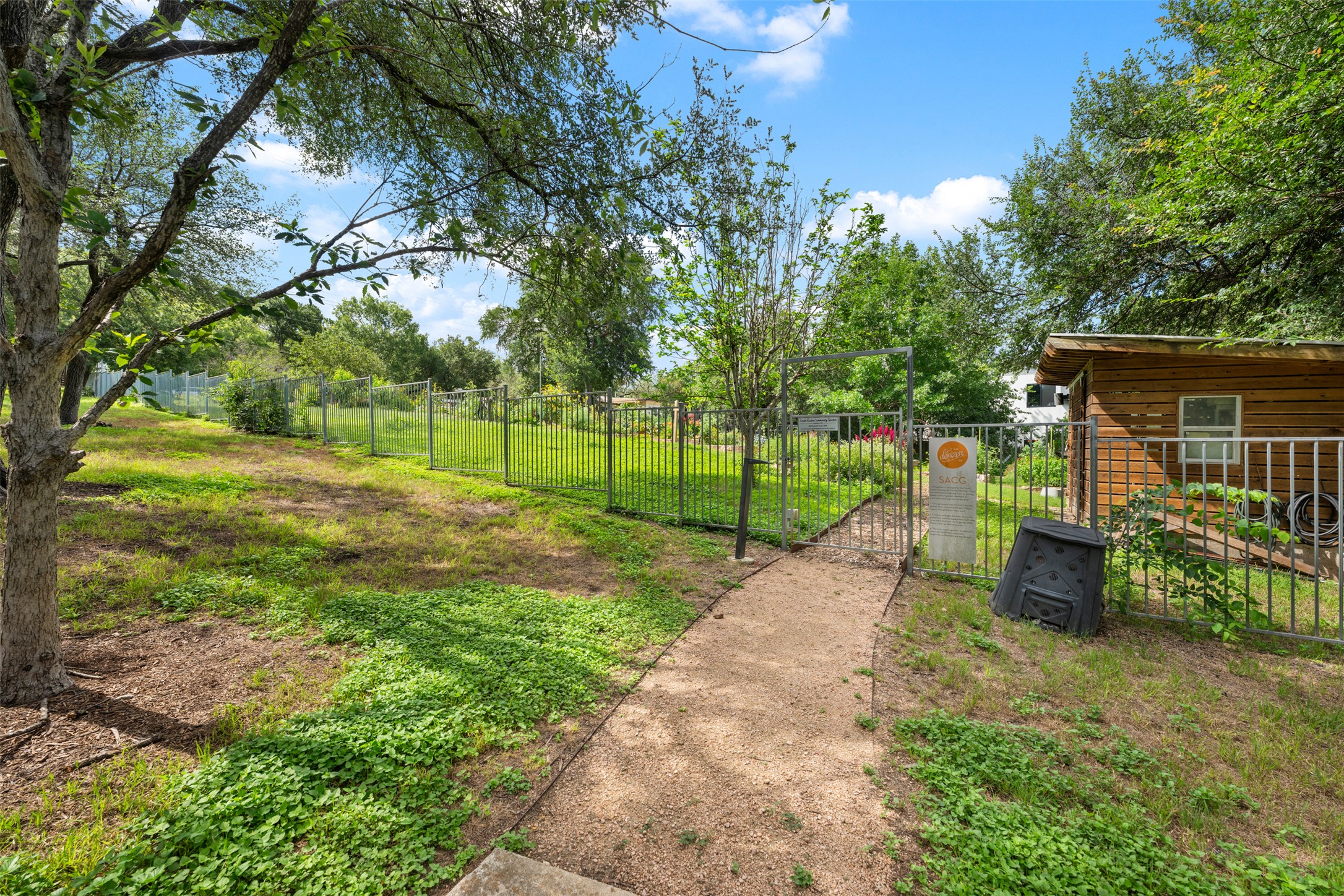 2804 Treble Lane, Unit 902 Austin, TX 78704 - Photo 27 of 31 a view of a park with large trees