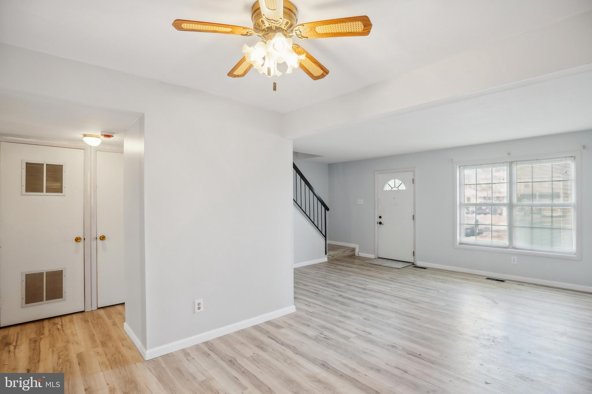 29 Maureen Court Sicklerville, NJ 08081 - Photo 14 of 14 wooden floor in an empty room with a window