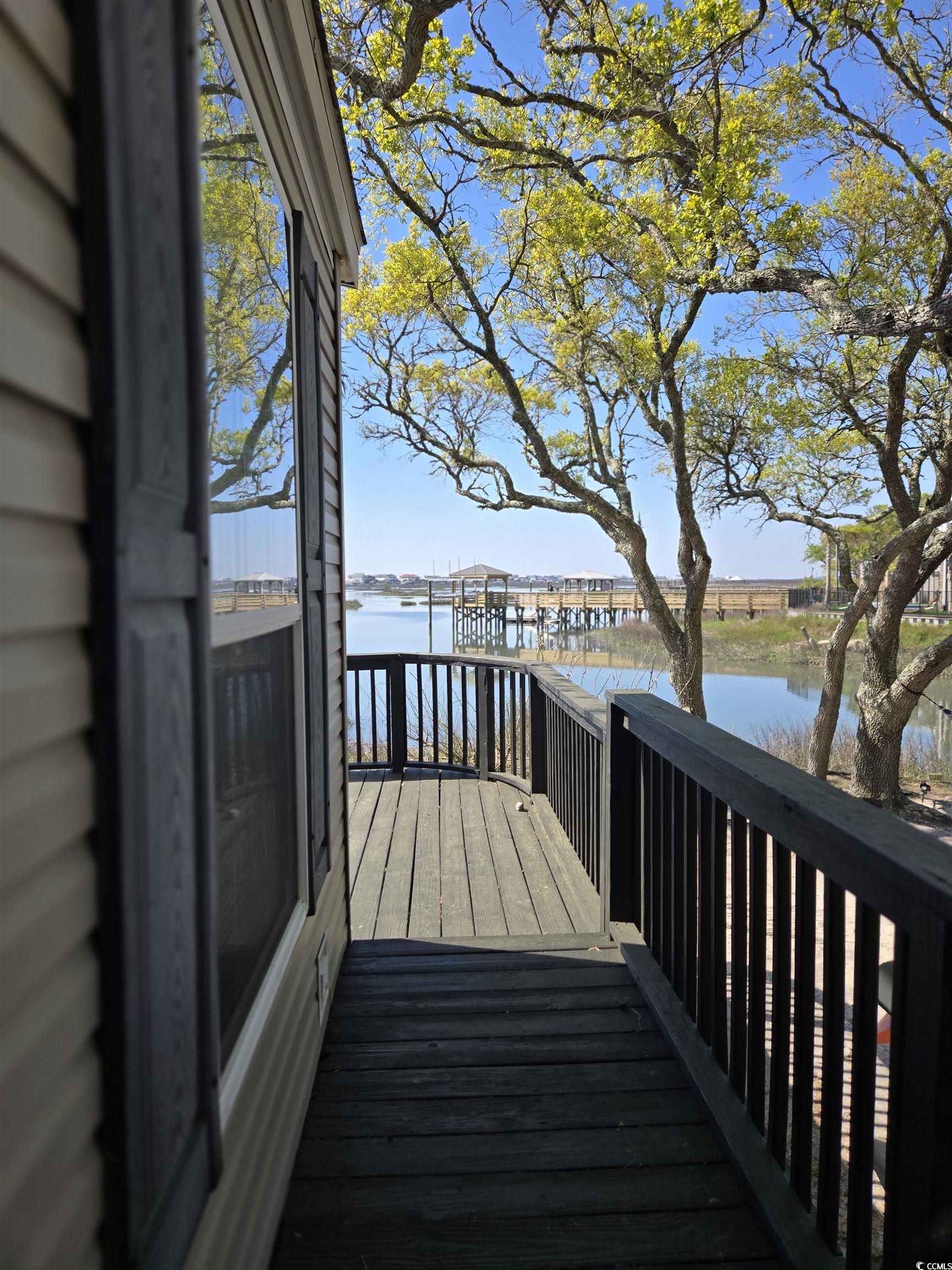 348 Ocean Breeze Drive Murrells Inlet, SC 29576 - Photo 8 of 38 Deck featuring a water view