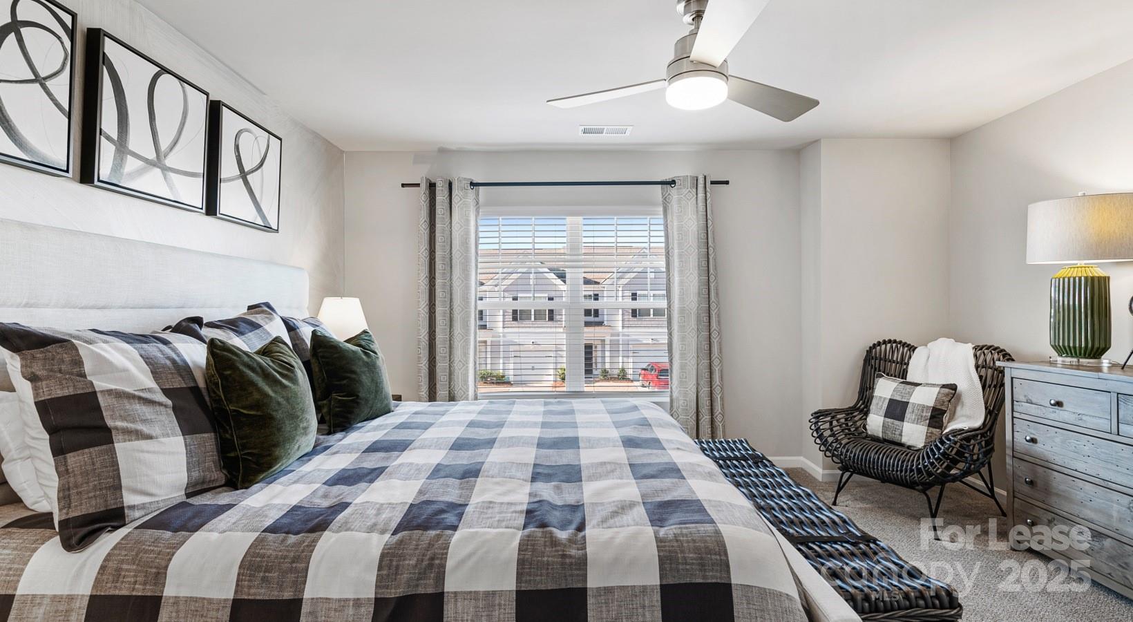 525 Wayforth Road Northwest, Unit B3 Concord, NC 28027 - Photo 21 of 23 a bedroom with double bed and a window