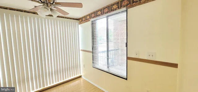 a view of a room with a large window