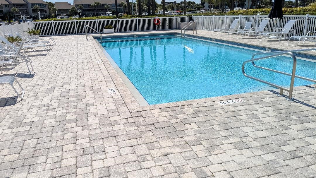 1903 Bay Road, Unit 206 Vero Beach, FL 32963 - Photo 13 of 30 a view of swimming pool and sitting area