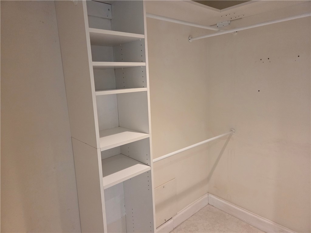 1903 Bay Road, Unit 206 Vero Beach, FL 32963 - Photo 25 of 30 a view of an empty walk in closet