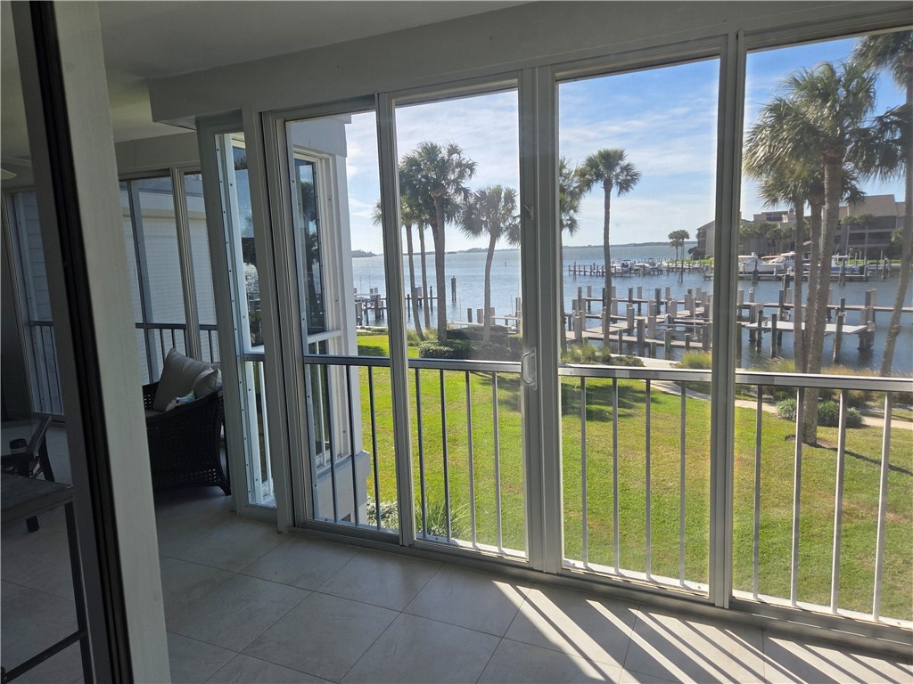 1903 Bay Road, Unit 206 Vero Beach, FL 32963 - Photo 27 of 30 a view of a balcony with floor to ceiling windows