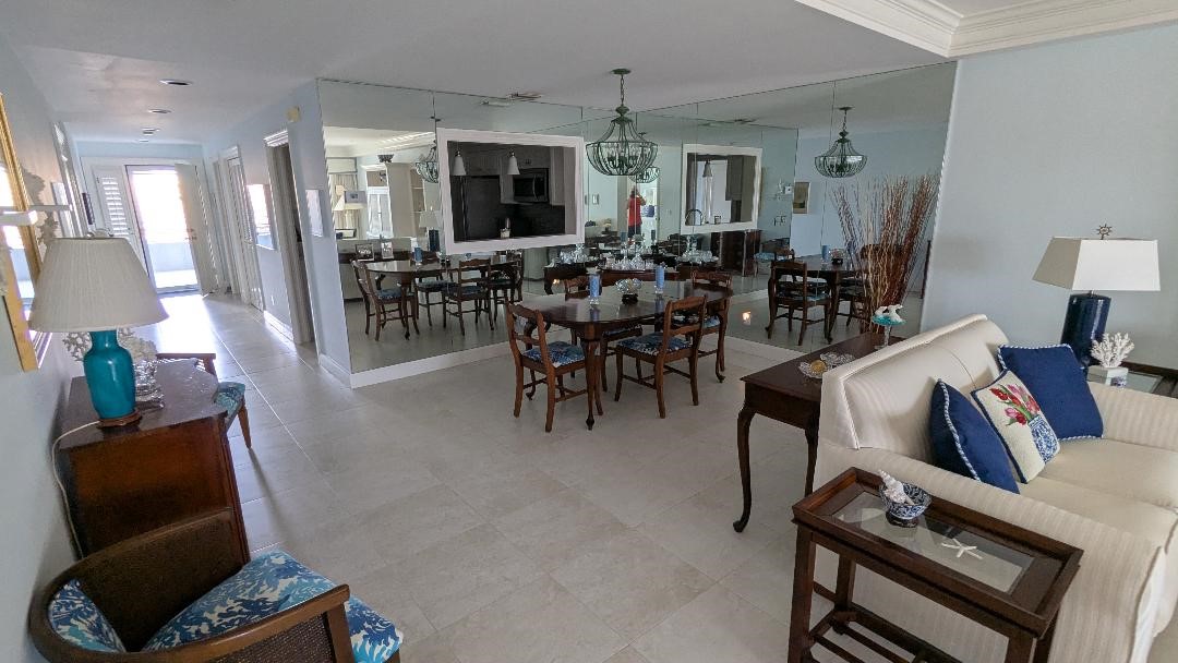 1903 Bay Road, Unit 206 Vero Beach, FL 32963 - Photo 9 of 30 a view of a livingroom with furniture and a flat screen tv