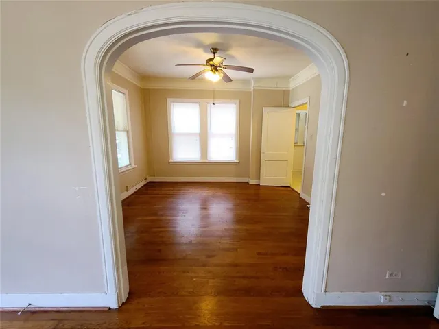 a view of livingroom with hardwood floor and hallway