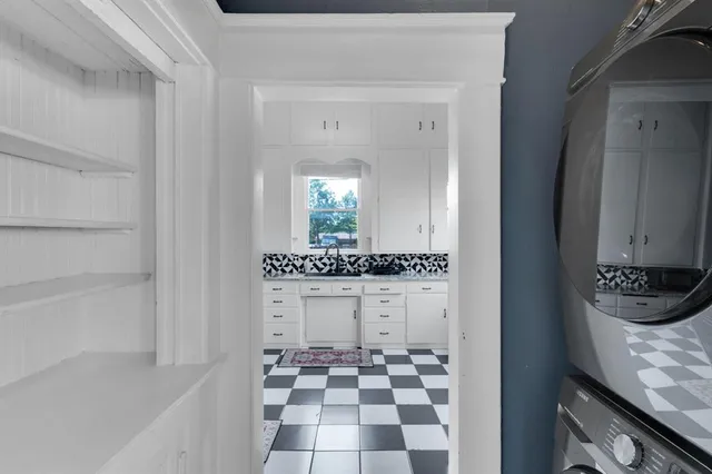 a bathroom with a bathtub and a sink