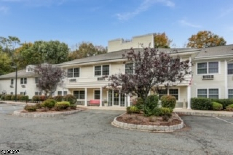 84 Sparta Avenue Sparta, NJ 07871 - Photo 1 of 1 a front view of a house with a yard