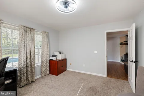 a view of livingroom with furniture and windows