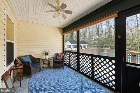 a balcony view with a large window