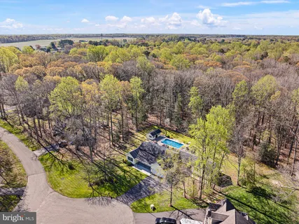 a view of a lake with a yard