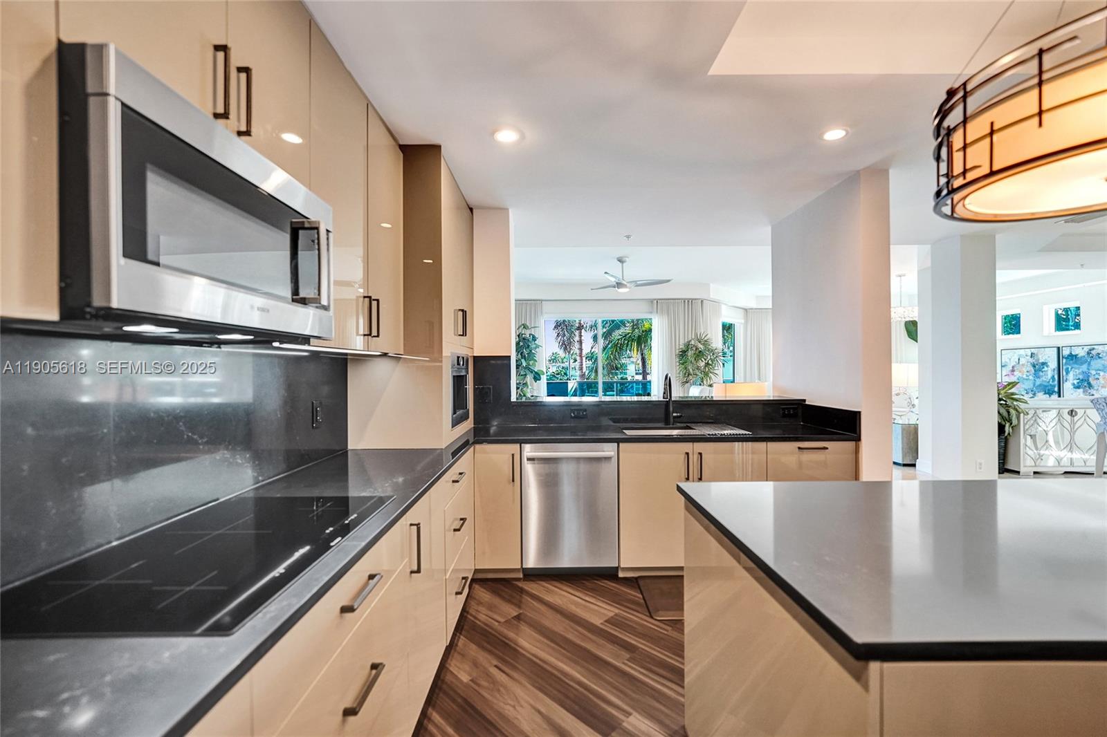 516 Hendricks Isle, Unit 2C Fort Lauderdale, FL 33301 - Photo 18 of 77 a large kitchen with stainless steel appliances a large counter top