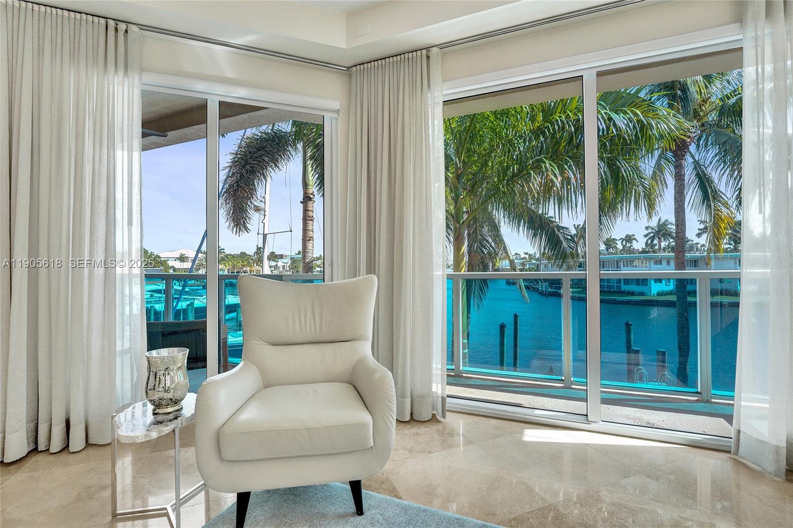 516 Hendricks Isle, Unit 2C Fort Lauderdale, FL 33301 - Photo 33 of 77 a view of a livingroom with furniture and front door