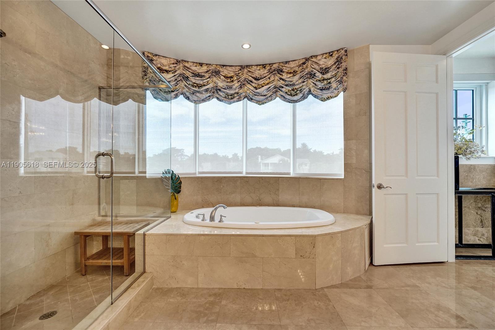 516 Hendricks Isle, Unit 2C Fort Lauderdale, FL 33301 - Photo 41 of 77 a view of a bathtub in a room